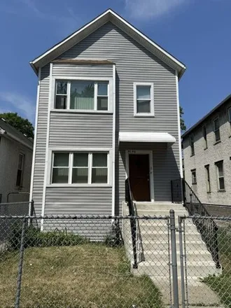 Buy this 4 bed house on 5548 South Princeton Avenue in Chicago, IL 60621