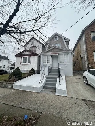 Buy this 4 bed house on 107-18 107th Avenue in New York, NY 11417