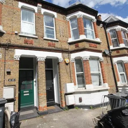 Rent this 2 bed townhouse on Dorchester Grove in London, W4 2JZ