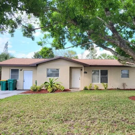 Rent this 3 bed house on 552 Charles Drive in Melbourne, FL 32935