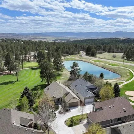 Buy this 3 bed house on 1361 Castlepoint Circle in Castle Pines, CO 80108