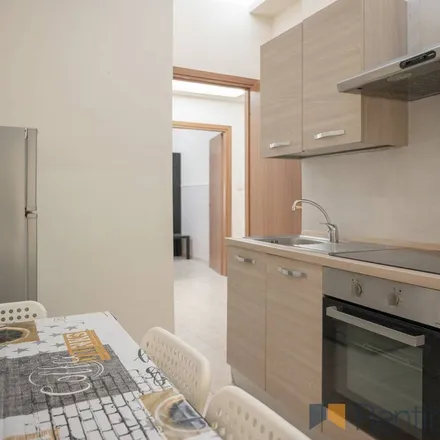 Rent this 4 bed apartment on Modà in Via Marco Ulpio Traiano, 20156 Milan MI