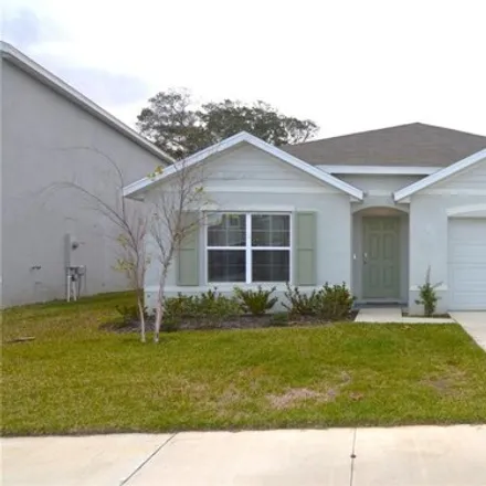 Rent this 4 bed house on Spanish Rose Drive in Dade City, FL 33525