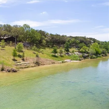 Rent this 4 bed house on 100 Deer Crossing Lane in Pioneer Town, Wimberley