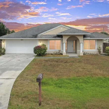 Buy this 3 bed house on 5845 Burney Street in Port Saint Lucie, FL 34986