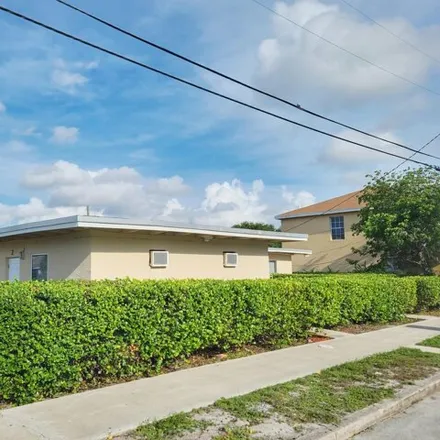 Buy this 4 bed house on 903 8th Street in West Palm Beach, FL 33401