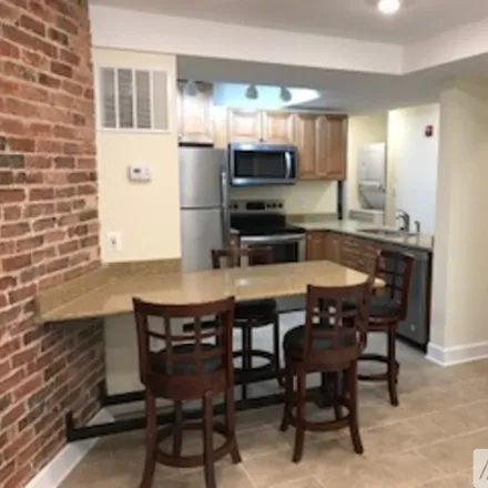 Rent this 3 bed townhouse on 1833 Lamont Street NW