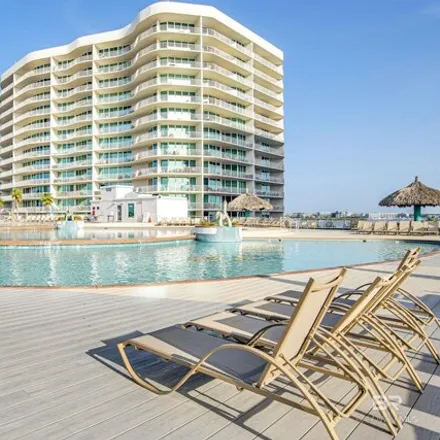 Buy this 2 bed condo on Caribe Tower D in 28107 Perdido Beach Boulevard, Orange Beach