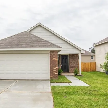Rent this 3 bed house on 13824 Winding Path Ln in Willis, Texas