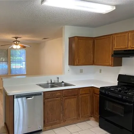 Rent this 2 bed condo on 1403 Elm Brook Drive in Austin, TX 78758