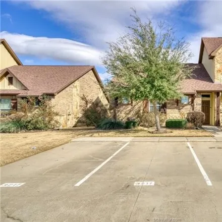 Rent this 3 bed townhouse on 3217 Papa Bear Drive in Koppe, College Station