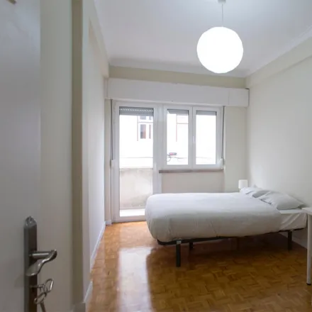 Rent this 6 bed room on Rua Abel Feijó in 1500-098 Lisbon, Portugal