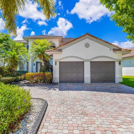 Rent this 5 bed house on 3649 Heron Ridge Ln in Weston, FL 33331