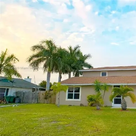 Rent this 5 bed house on 2112 Southeast E Dunbrooke Circle in Port Saint Lucie, FL 34952