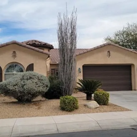 Rent this 4 bed house on 2419 North 141st Lane in Goodyear, AZ 85395