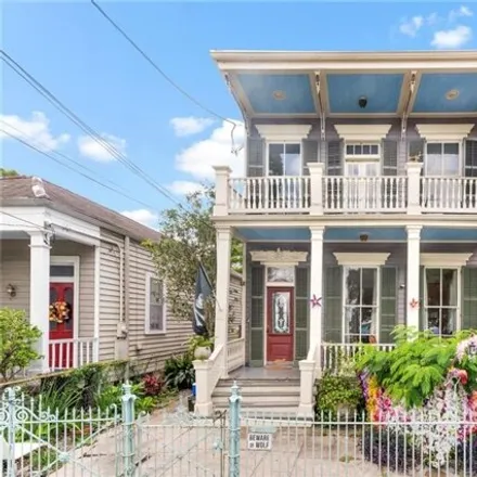 Rent this 2 bed townhouse on 527 Delaronde Street in Algiers, New Orleans