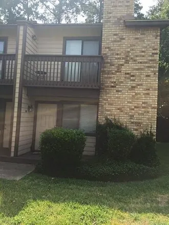 Rent this 2 bed townhouse on 2599 Crosstimbers Street in Huntsville, TX 77320