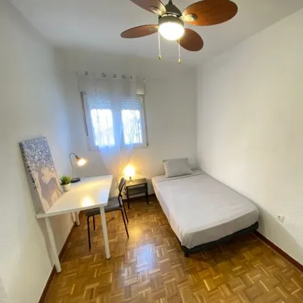 Rent this 3 bed room on Madrid in Calle del Hornero, 28019 Madrid