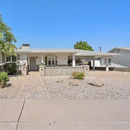 Buy this 4 bed house on 6608 East Wilshire Drive in Scottsdale, AZ 85257