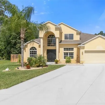 Buy this 4 bed house on 99 Edmond Place in Palm Coast, FL 32164