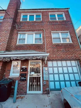 Buy this 5 bed townhouse on 61-30 164th Street in New York, NY 11365