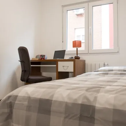 Rent this 3 bed room on Calle de Antonio Salvador in 64, 28026 Madrid