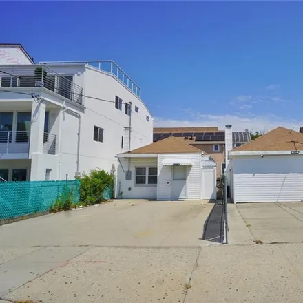 Buy this 3 bed house on 1611 Oriental Boulevard in New York, NY 11235