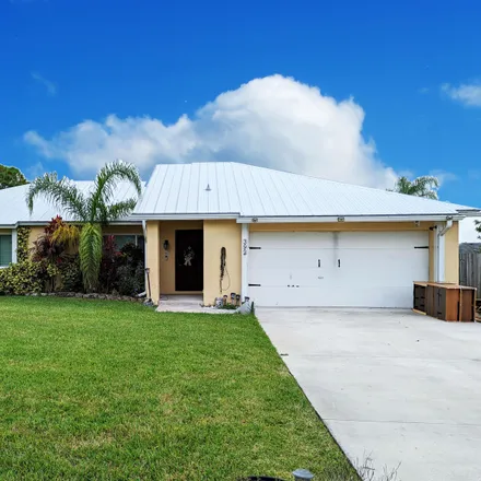 Buy this 3 bed house on 392 Southeast Crosspoint Drive in Port Saint Lucie, FL 34983