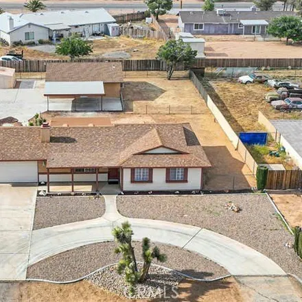 Buy this 5 bed house on 22308 Isatis Avenue in Apple Valley, CA 92307