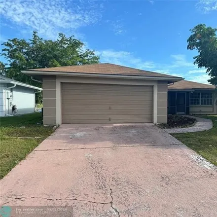 Buy this 3 bed house on 9807 Deerfoot Drive in Cypress Lake, FL 33919