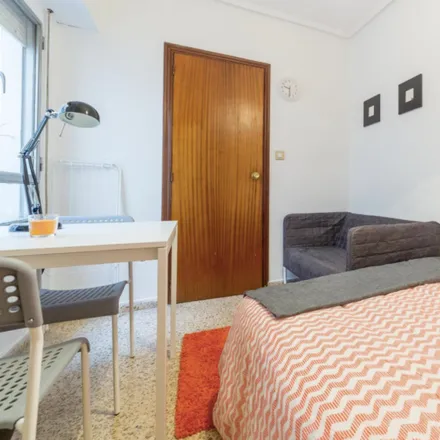 Rent this 5 bed room on Horno María in Carrer del Poeta Mas i Ros, 46021 Valencia