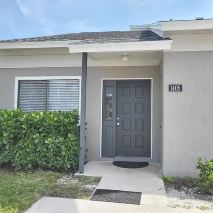 Buy this 3 bed townhouse on 1481 Wharf Lane in Greenacres, FL 33463