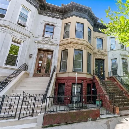 Buy this 5 bed townhouse on 700 Park Place in New York, NY 11216
