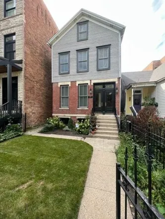 Rent this 2 bed house on 1424 North Hoyne Avenue in Chicago, IL 60647