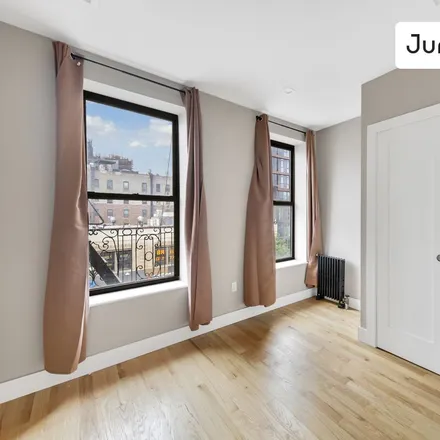 Rent this 4 bed room on 301 Saint Nicholas