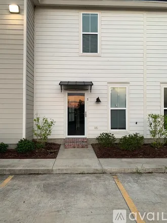 Rent this 2 bed townhouse on 4320 Louisiana Avenue
