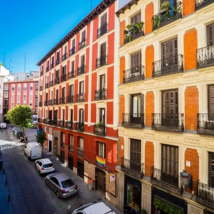 Rent this 7 bed apartment on Mao & Cathy in Calle de Caños del Peral, 5