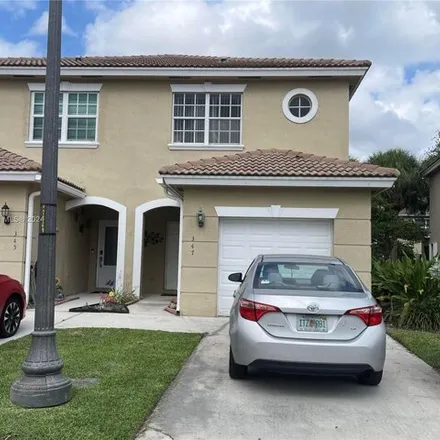 Buy this 3 bed townhouse on 345 Southwest 121 Avenue in Pembroke Pines, FL 33025