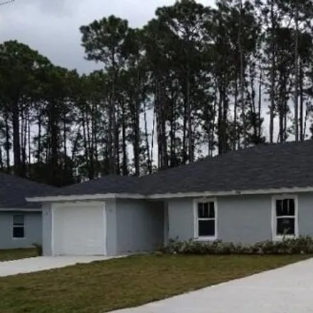 Buy this 4 bed house on 159 Ullian Trail in Palm Coast, FL 32164