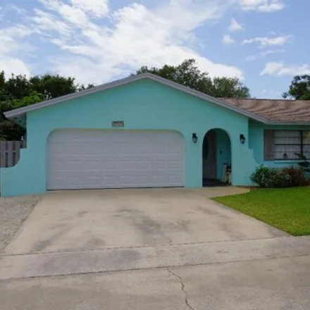 Buy this 3 bed house on 156 Holiday Lane in Cocoa Beach, FL 32931