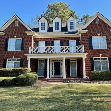 Rent this 4 bed house on 233 Birdwood Court in Cary, NC 27519