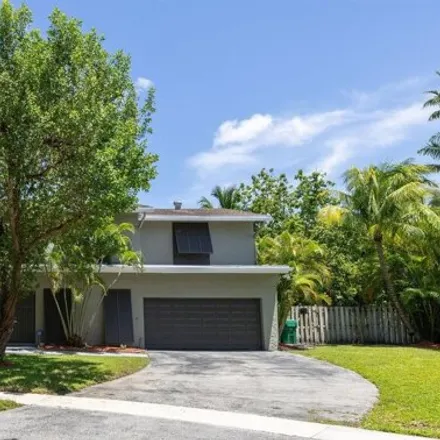 Buy this 4 bed house on 10100 SW 53rd Ct in Cooper City, Florida