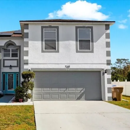 Buy this 4 bed house on 1143 Normandy Drive in Poinciana, FL 34759