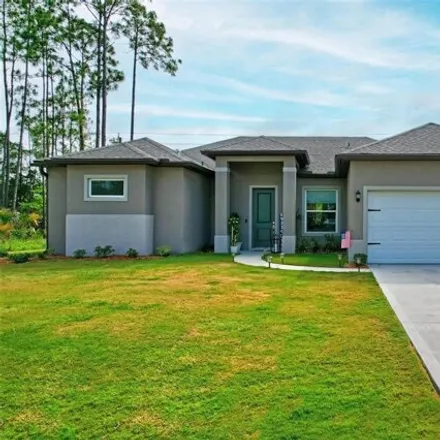 Buy this 3 bed house on 65 Raintree Pl in Palm Coast, Florida