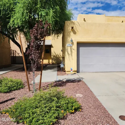 Rent this 3 bed townhouse on 4179 North Fortune Loop in Tucson, AZ 85719
