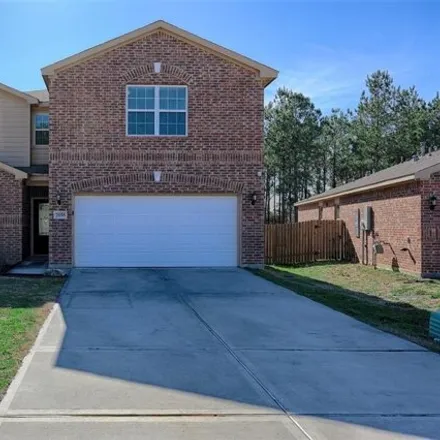 Buy this 5 bed house on 7664 Dragon Pearls Lane in Conroe, TX 77304