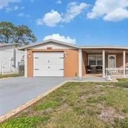 Buy this 2 bed house on 3437 Garfield Drive in Holiday, FL 34691