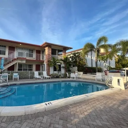 Buy this 2 bed condo on 3229 Northeast 15th Street in Country Club Isles, Pompano Beach