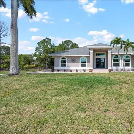 Buy this 4 bed house on 14755 74th Street North in Palm Beach County, FL 33470