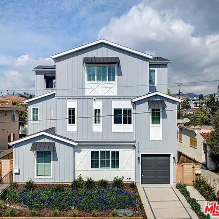 Rent this 4 bed house on 12047 Mayfield Avenue in Los Angeles, CA 90049